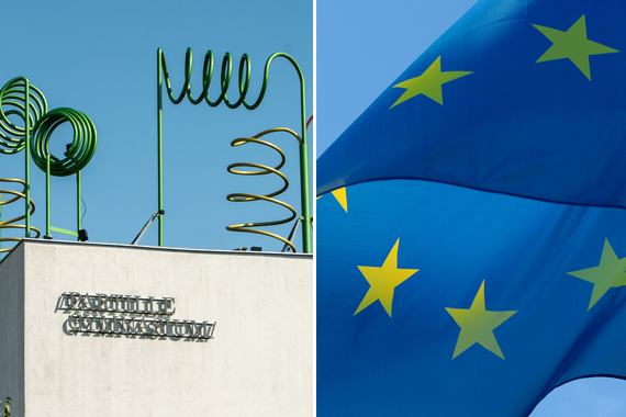 Bilden visar taket samt skylten på fasaden för Partille gymnasium och en europaflagga. 